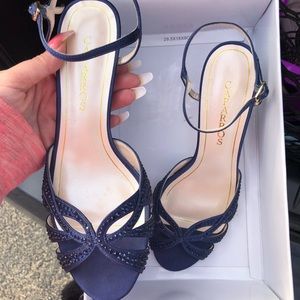 Caparro’s blue heels size 8